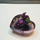 Purple, pink, and black tentacle ring dish