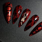 Bad Romance: Press in Nails